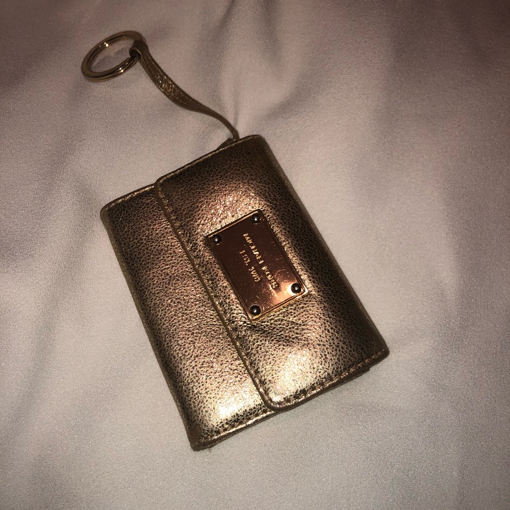 Shimmering gold Micheal Kors wallet
